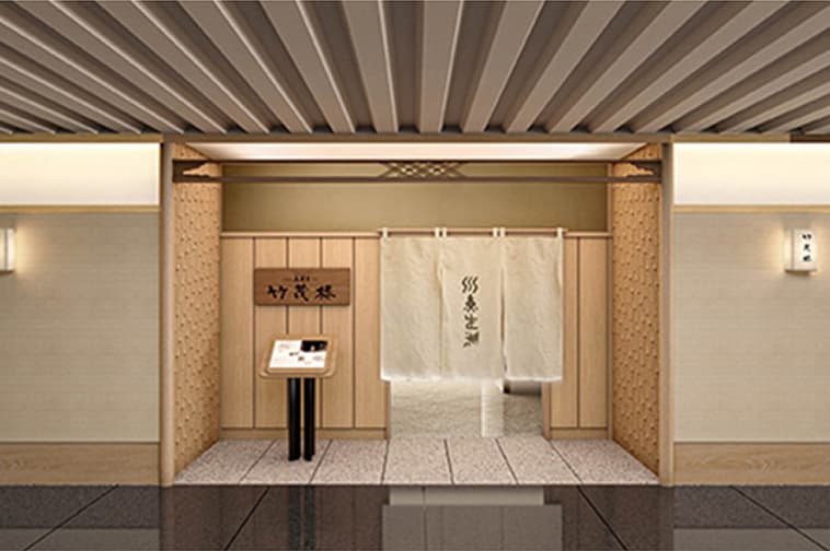 木格子と落ち着いた照明が特徴的な和モダンな会席料理店の内観